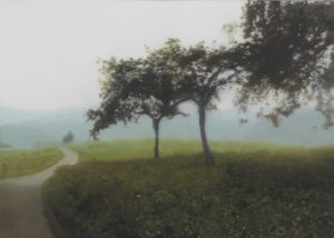 A painting of a grassy hilltop with trees and a road, hazy mountains in the distance, and a grey sky.