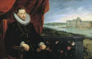 A painting of Archduke Albert, dressed elegantly in black with a large white collar, seated in the foreground on the left, with a palace in the background.